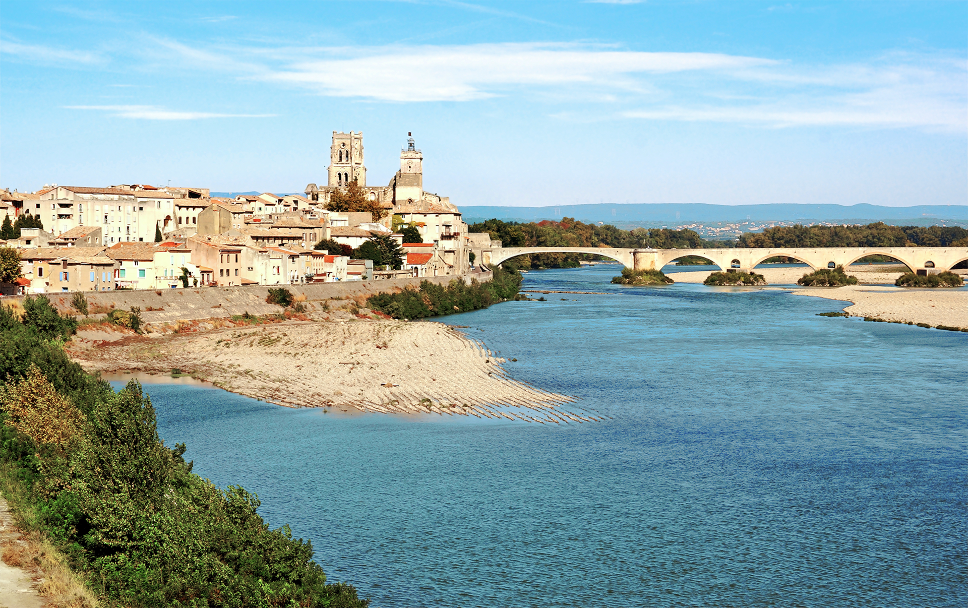 The southern French town of Pont-Saint-Esprit with its medieval stone bridge over the Rhone River. (Source: iStock.com/Max Labeille) The southern French town of Pont-Saint-Esprit with its medieval stone bridge over the Rhone River. (Source: iStock.com/Max Labeille)